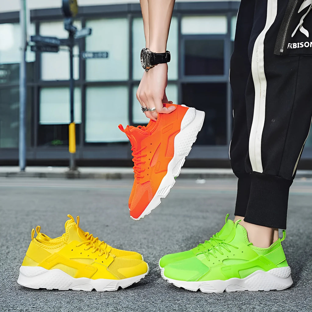 Men's low-top casual sneakers with mesh upper, round toe, and cross shoulder straps in multiple colour options