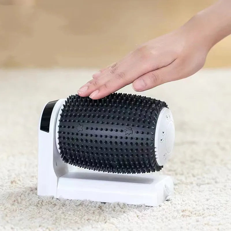 White automatic cat self groomer mounted in a wall corner with soft silicone bristles for grooming and massage