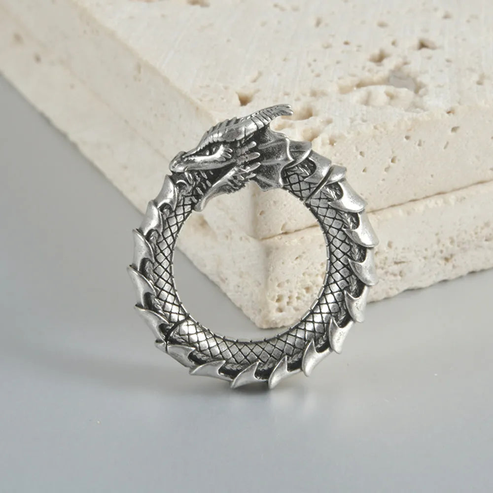 Large antique silver geometric dragon hollow out stainless steel earrings for men and women.