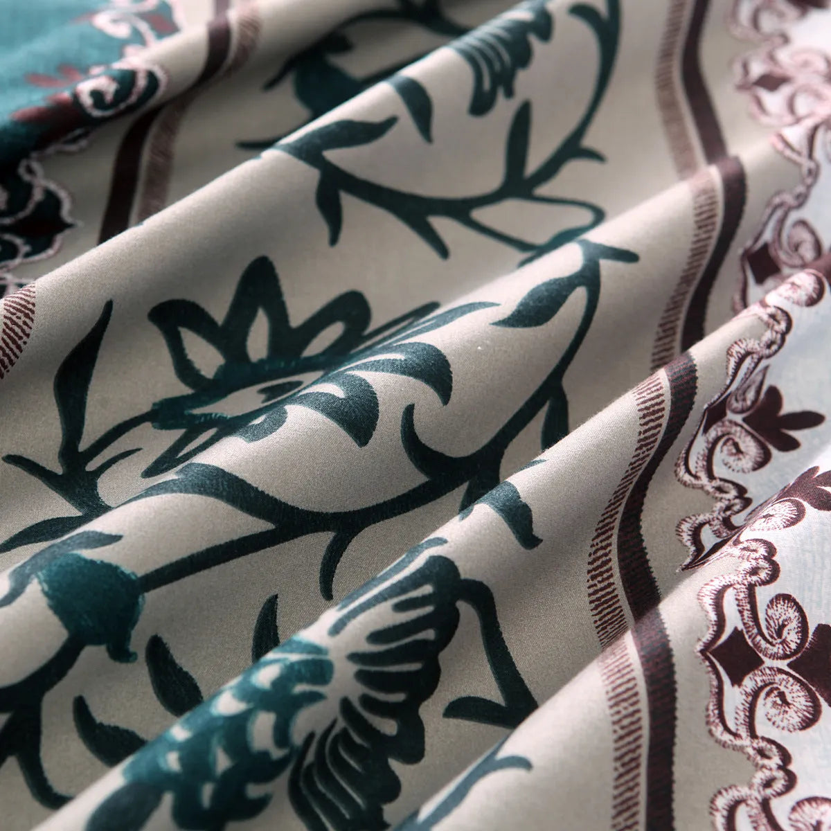Polyester duvet cover set with plain weave reactive printing in peacock blue colour on a bed
