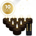 Four black LED tealight candles with flickering flame effect, shown from above.