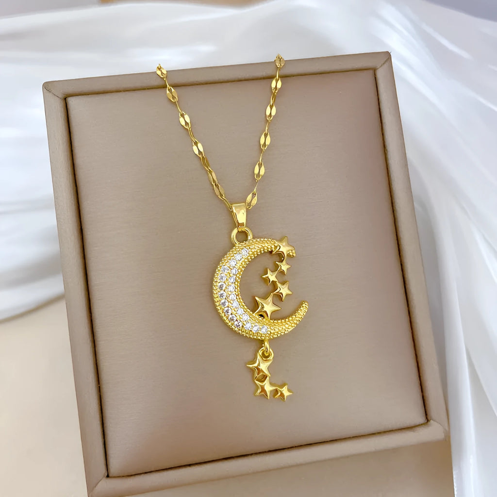 Stainless steel necklace with moon pendant and geometric tassel elements