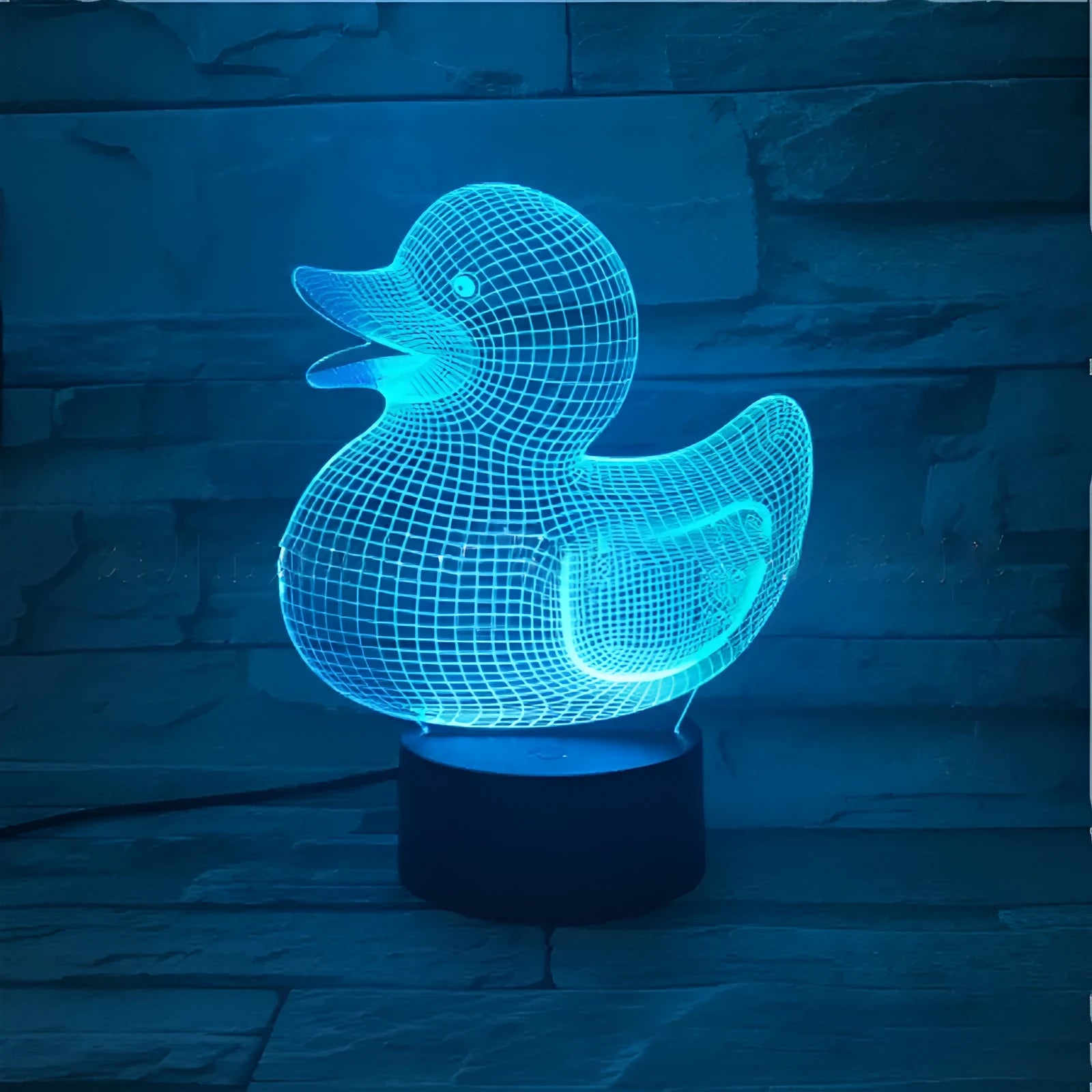 Yellow duck-shaped 3D night light with seven colour LED modes and touch/remote control