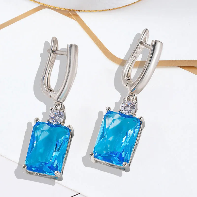 Square geometric earrings with electroplated gold or silver finish on copper