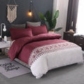 Polyester duvet cover set with plain weave reactive printing in peacock blue colour on a bed