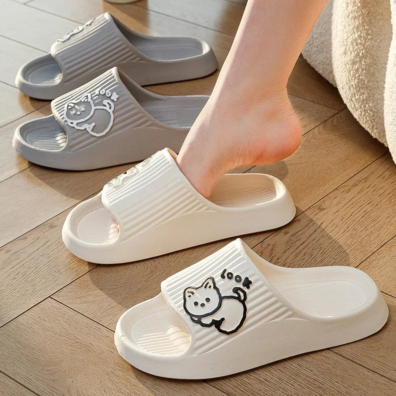 Green EVA platform slippers with a cat design on the upper, showing the thick non-slip sole.