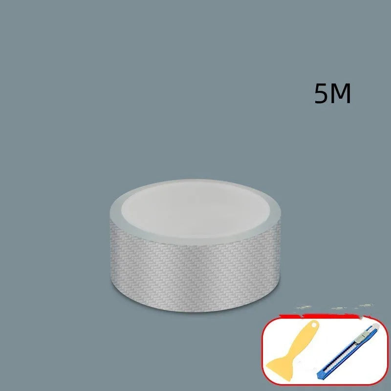 Roll of clear carbon fibre anti-collision film with scraper and utility knife for car door edges