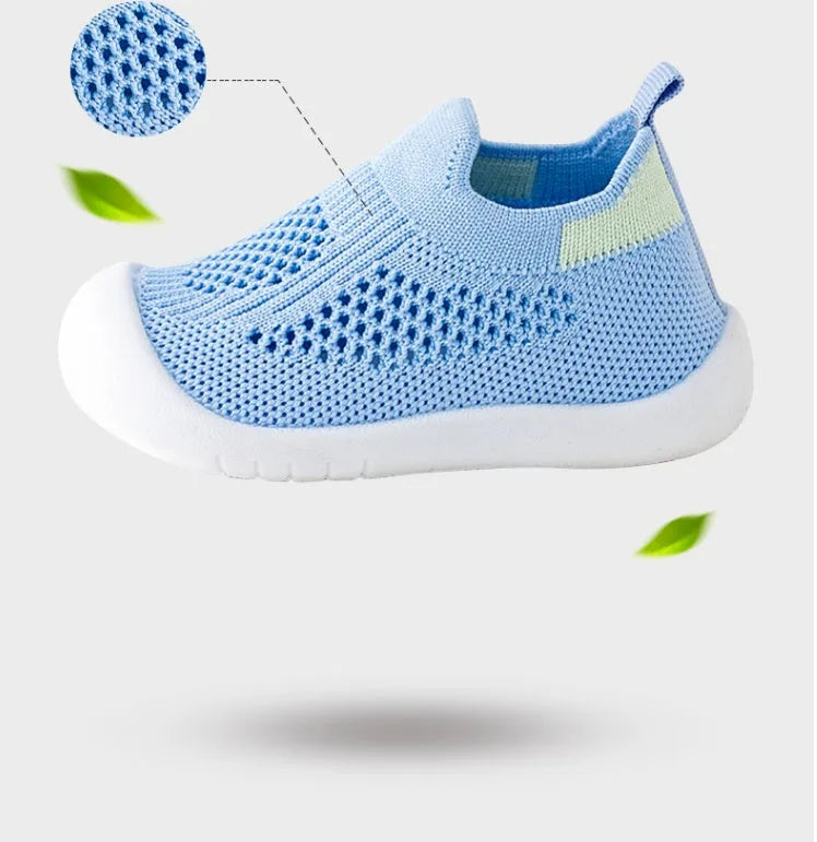 Baby soft sole non-slip walking shoes in cream yellow with fly woven cotton upper and natural rubber sole