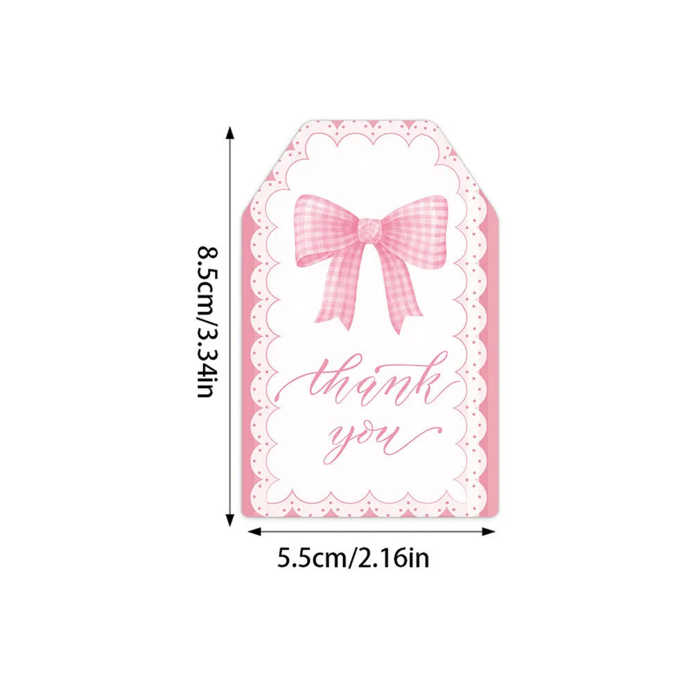 Bowknot-shaped paper gift tags with natural hemp rope ties for birthday party decoration