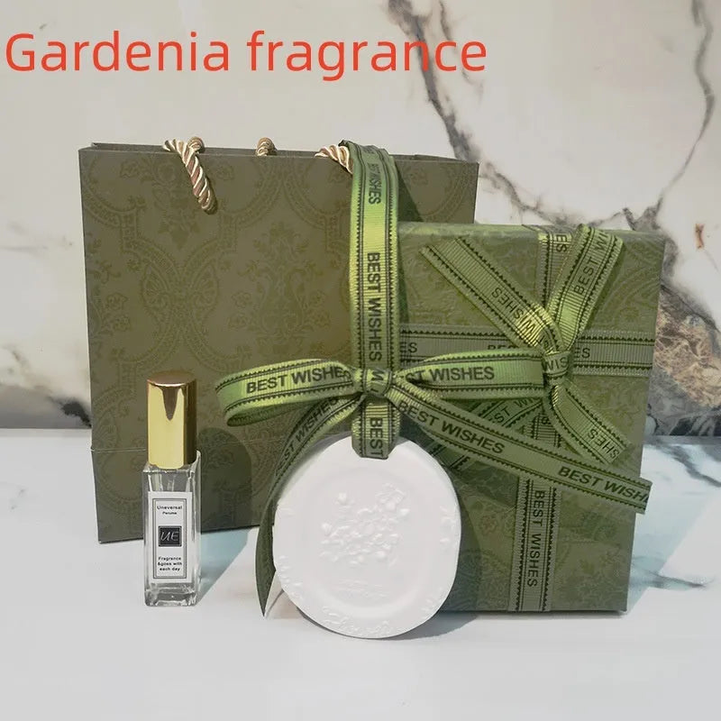 Car aromatherapy stone pendant hanging from rearview mirror with gardenia fragrance option