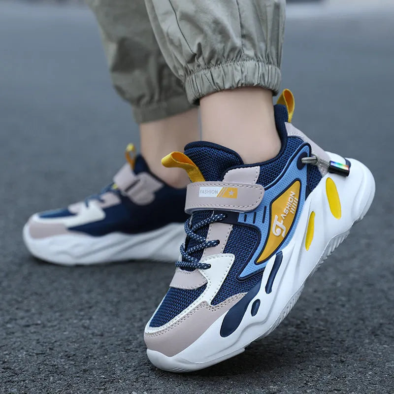 Boys' dark blue and beige PU mesh sports running shoes with Velcro strap and platform sole.