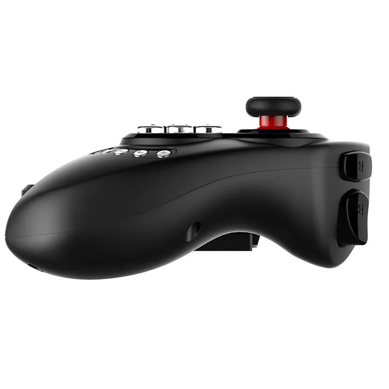 Telescopic wireless game controller extended to hold a mobile phone, showing USB connector.
