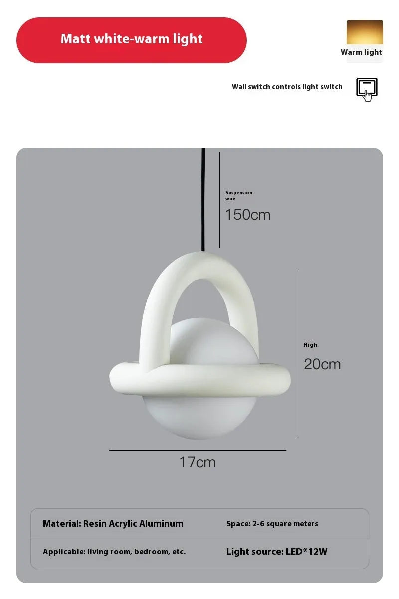 Modern Danish designer pendant lamp with adjustable cord in matte finish hanging above bedside