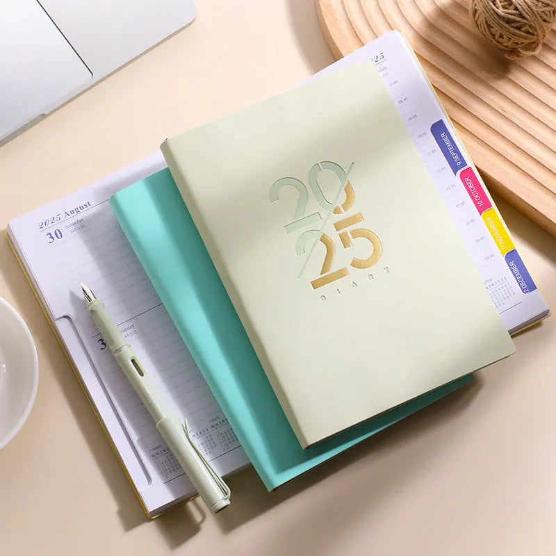Soft faux leather A5 schedule book with 150 pages open on desk