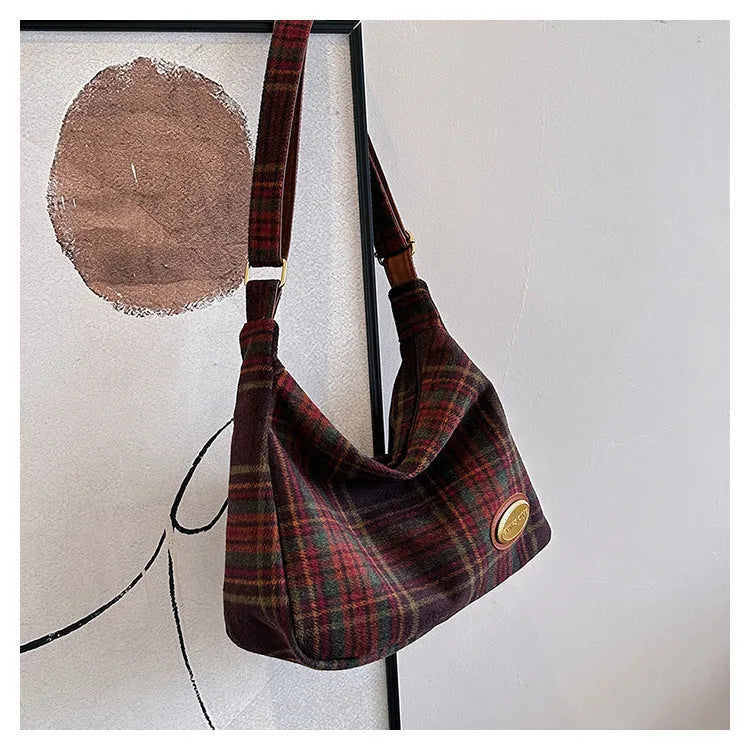 Large capacity soft woolen shoulder bag for women in khaki with pendant, horizontal square shape with sewing line detail.