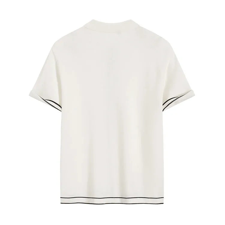 White women's short sleeve cardigan with contrast colour lapels on a hanger