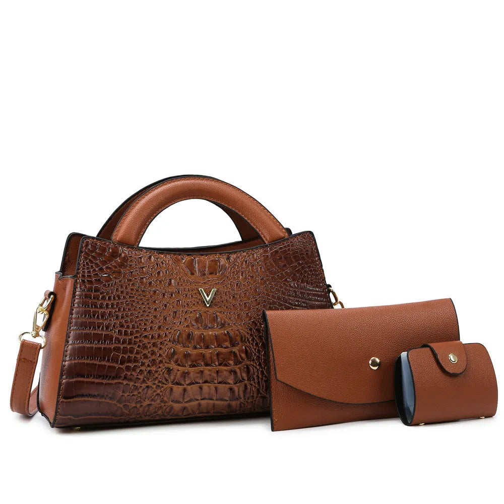 Women's black crocodile pattern PU leather crossbody handbag with gold hardware, shown open to reveal internal organiser pockets.