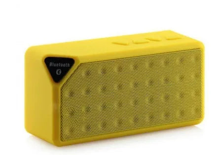 Cannon X3 Wireless Bluetooth Speaker cube in five colour options: black, blue, green, red, yellow