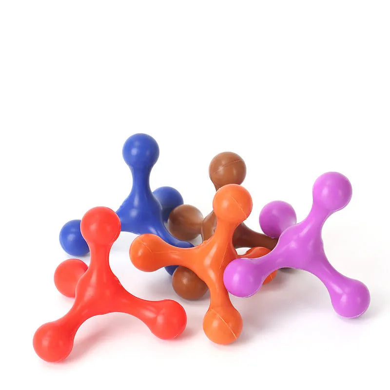 Blue silicone puppy chew toy shaped like a bone with three legs on a white background.