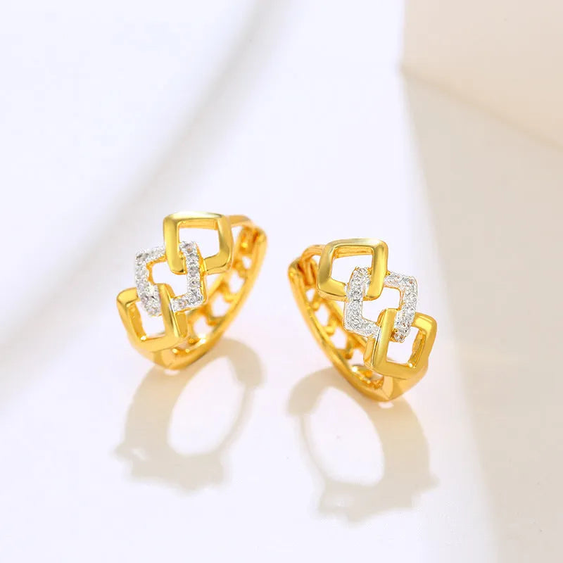 Geometric hollow-out alloy earrings with electroplated colour separation and clip fastening