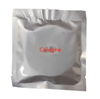 Solar-powered kinetic double ring rotating car air freshener fragrance diffuser on a car dashboard.