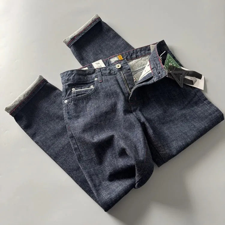 Men's primary colour straight leg denim trousers on a mid-waist fit model, showing American retro style.
