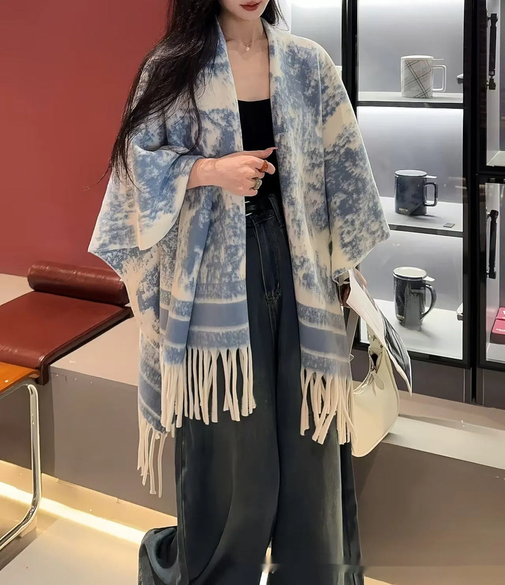 Women's polyester tassel scarf cape draped over shoulders in casual shawl style