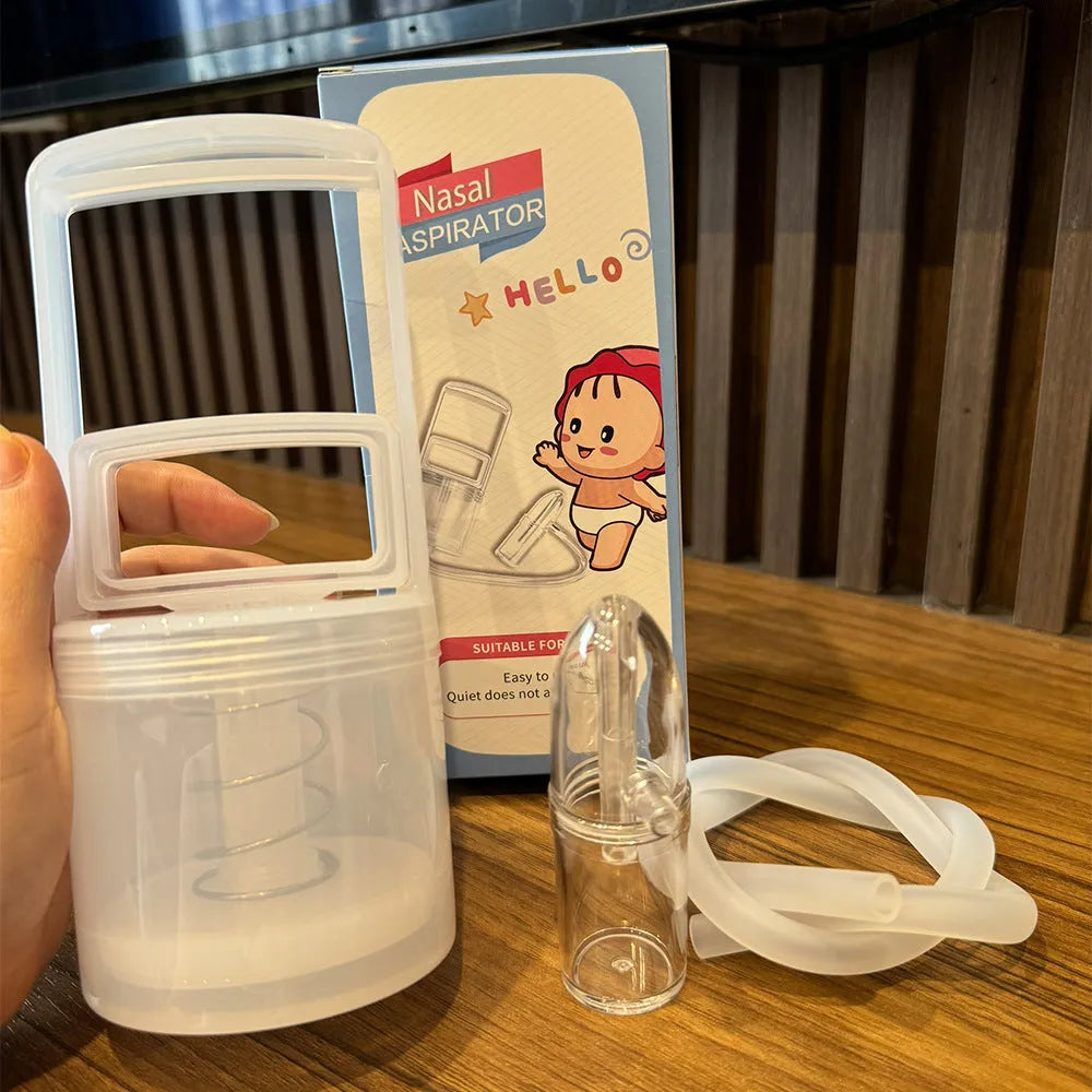 Hand-held baby nasal cavity cleaner in peacock blue with soft silicone tip and anti-backflow design