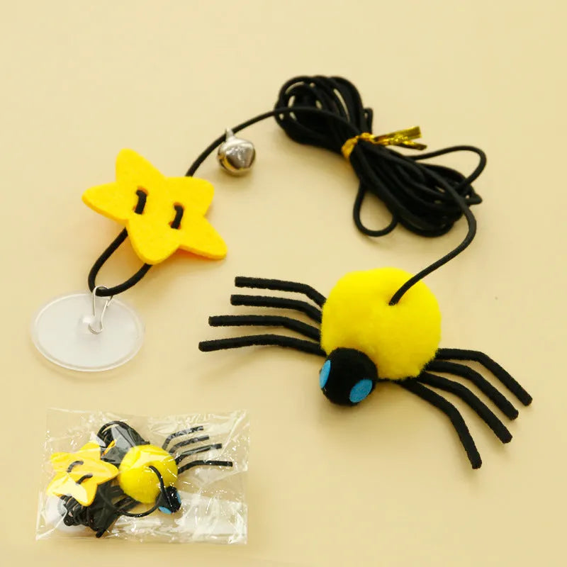 Hanging door cat toy with feather stick, bell, and spider attachment on elastic rope