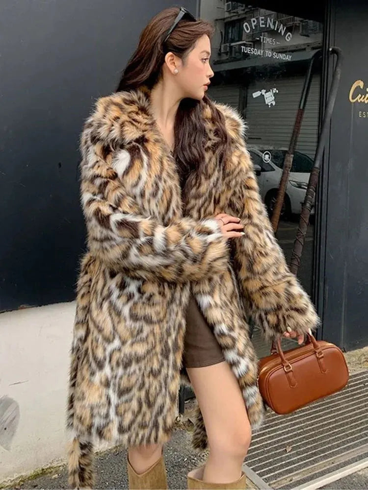 Faux fur coat with fox pattern styling and fur collar in long coat style