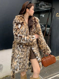 Faux fur coat with fox pattern styling and fur collar in long coat style