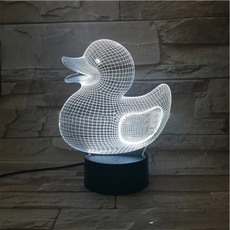 Yellow duck-shaped 3D night light with seven colour LED modes and touch/remote control