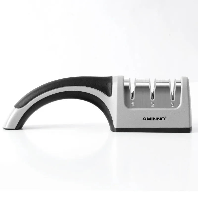 4-in-1 kitchen knife sharpener with multiple slots, black and cyan plastic and stainless steel body on a countertop