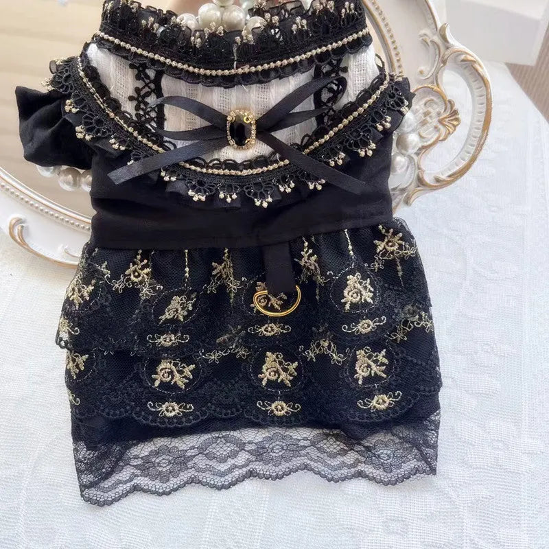 Golden Gothic princess-style skirt dress for a small dog or cat on a mannequin.