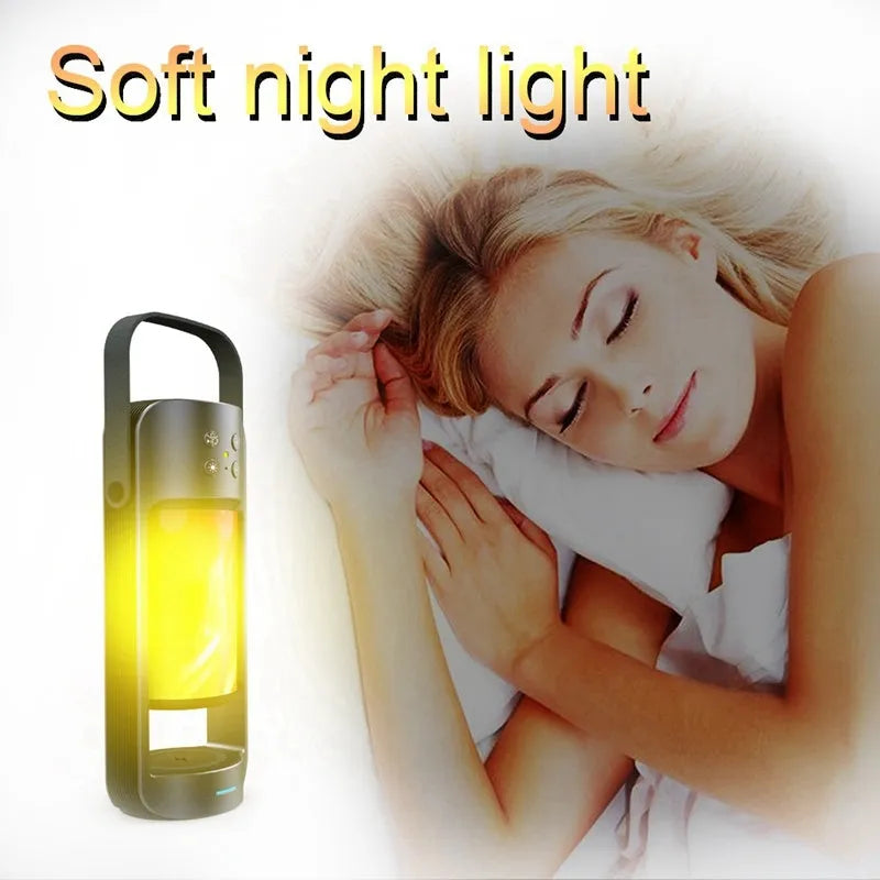 Portable Bluetooth speaker with warm yellow dancing flame light showing realistic campfire effect
