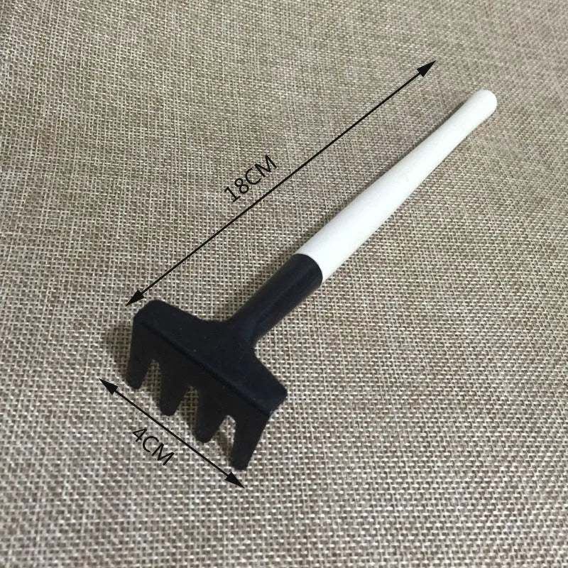 Succulent gardening tool set with watering can, small shovels, tweezers, and brush for indoor plants