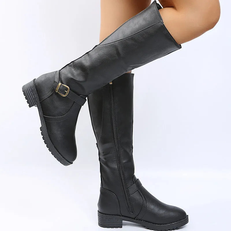 Women's solid colour knight boots with square heel, round toe, and belt buckle detail on a white background