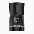 Black and white automatic pet feeder with digital timer display and USB cable