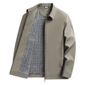 Men's solid color casual polo collar jacket in navy blue, loose fit, side seam pockets, polyester fabric