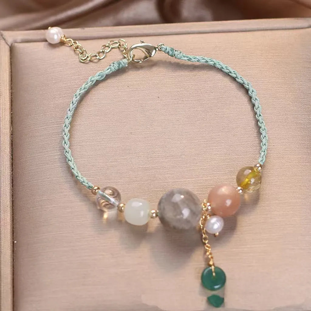 Hand-woven crystal peace buckle bracelet for women with sequins in red, green, and blue colours