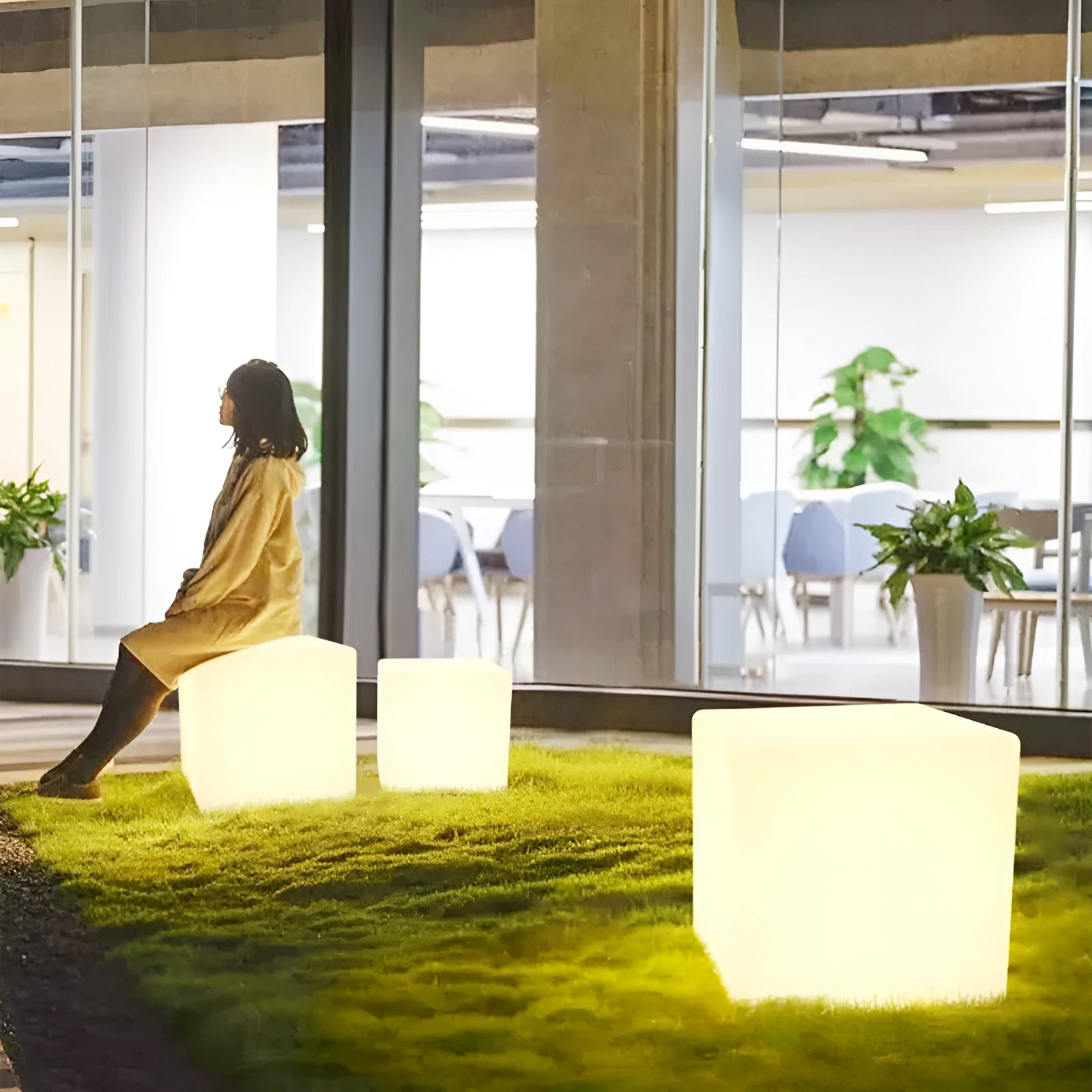 Square LED cube stool light with modern design for outdoor seating and illumination