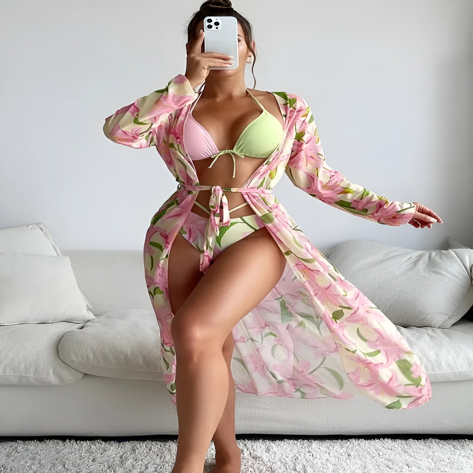 Colourful printed women's bikini swimsuit on a white background.