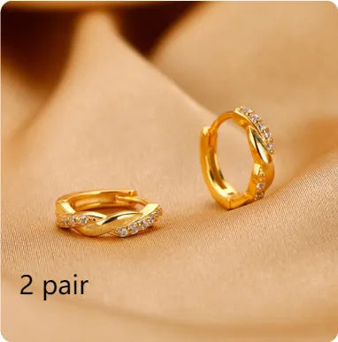 Geometric hemp rope earclip earrings with interwoven design in gold or silver colour options