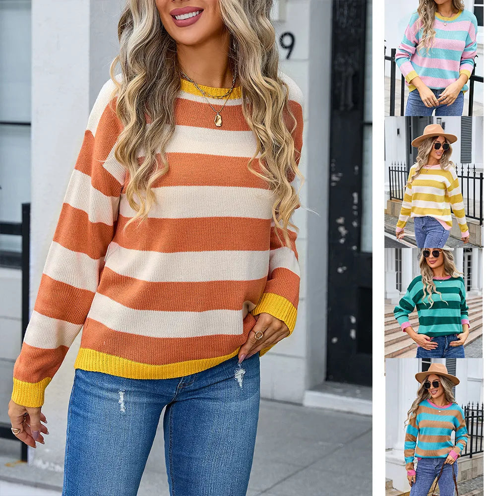 Women's loose fit long sleeve acrylic sweater in a striped pattern, shown in a blue colour.