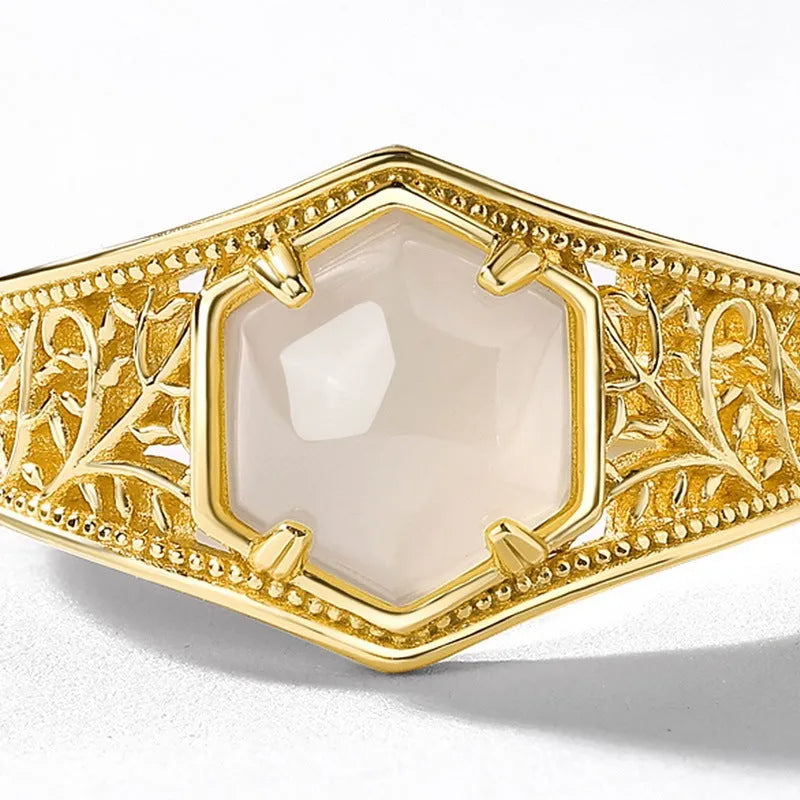 Silver hexagon geometric ring with 10k gold swimming paint finish and adjustable opening for women