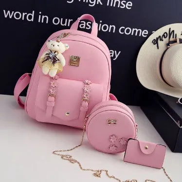 Three-piece PU leather bag set for teenage girls including backpack, shoulder bag and card holder