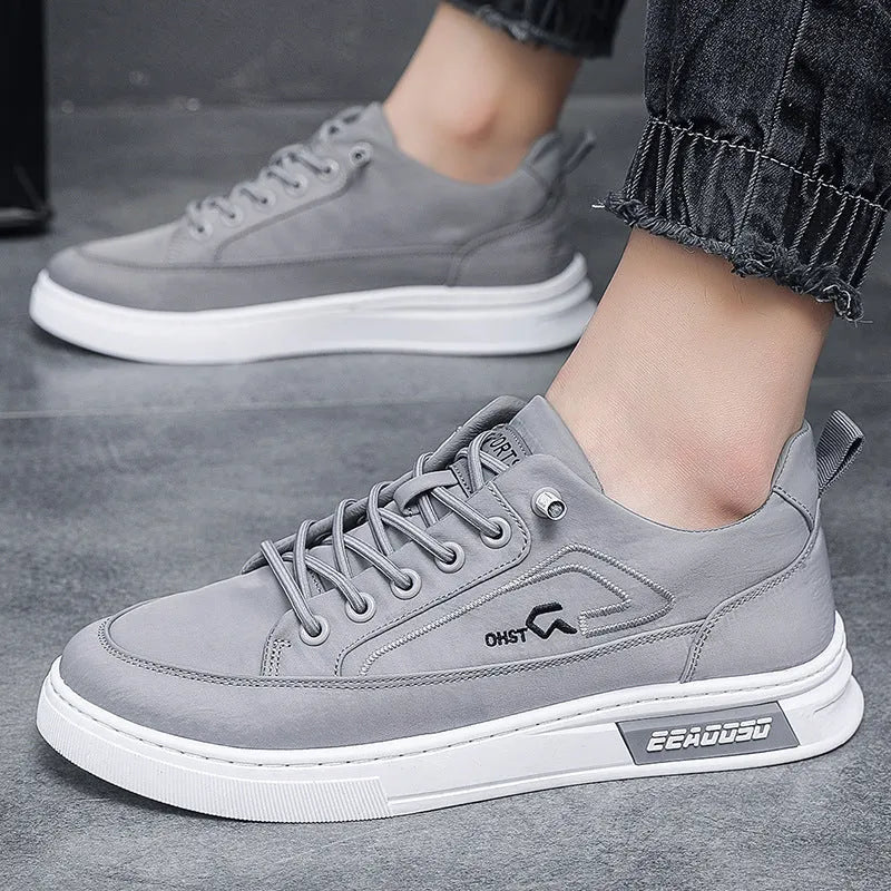 Men's grey casual shoes with canvas upper, leather lining, rubber sole, low-top, and lace-up front