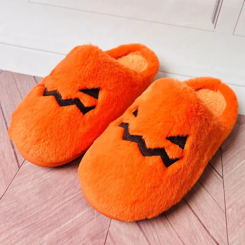 Orange plush-lined indoor slippers with non-slip PVC soles and coral velvet upper