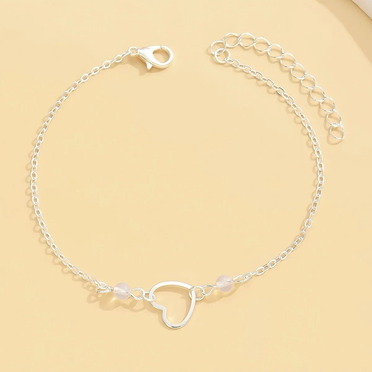 Women's adjustable heart-shaped pendant anklet in gold and silver geometric design