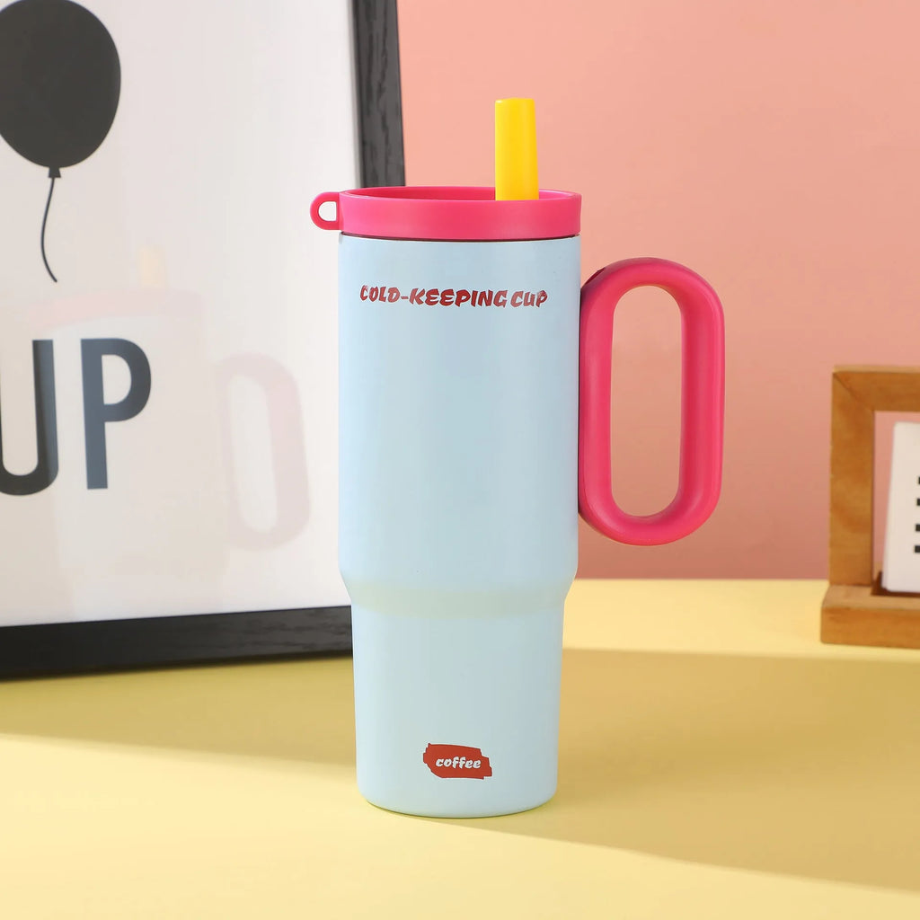 Portable insulated drink cup with carry handle and straw lid in multiple colours